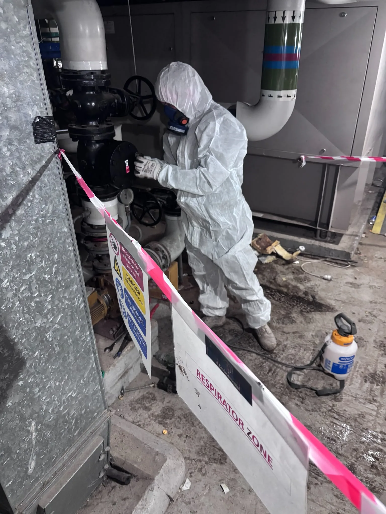 Asbestos artex removal from concrete soffit in Aldgate